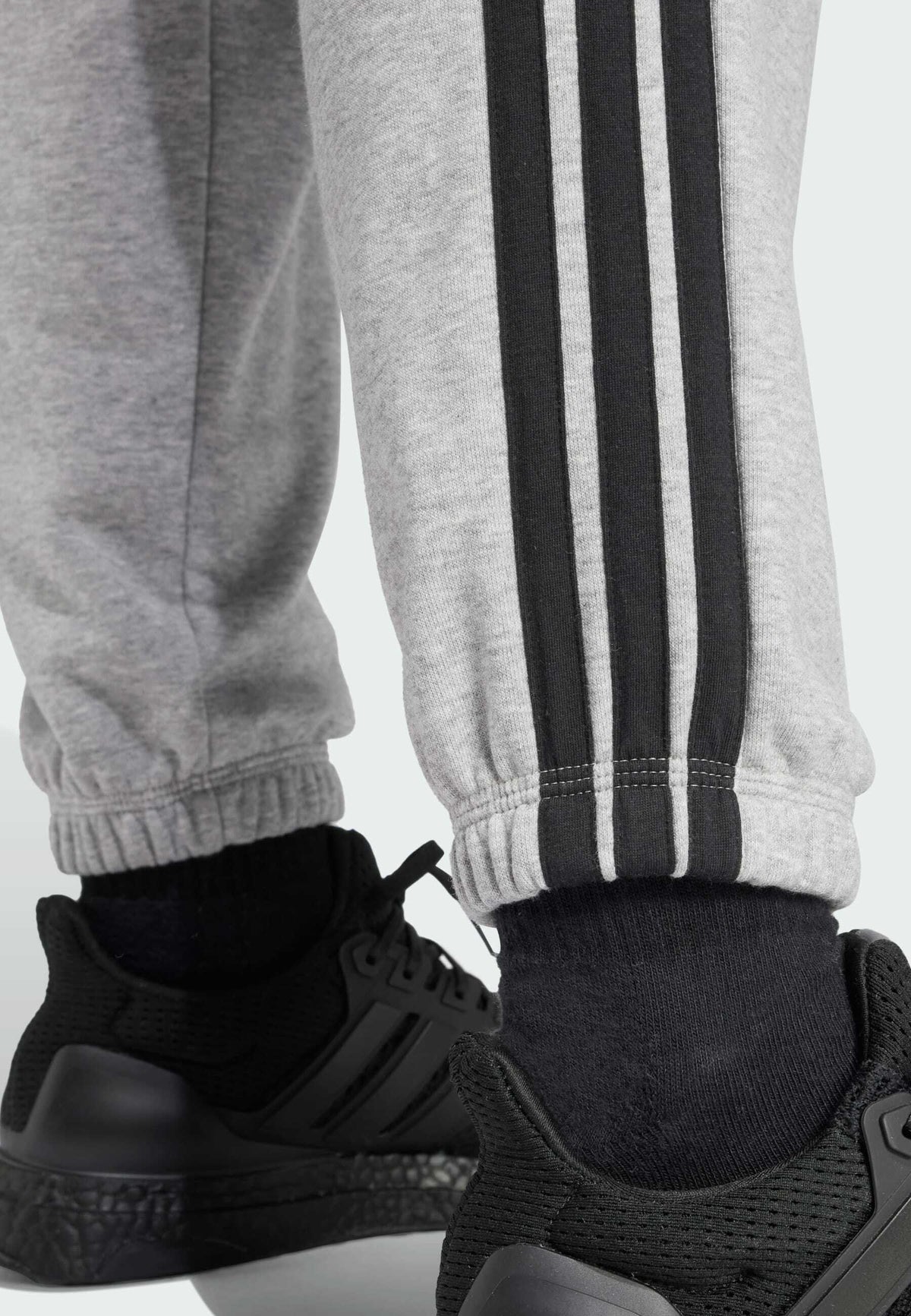 adidas Sportswear Essentials 3 Stripes Cuffed Pants – Pantalon de survêtement Femme – medium grey heather   black/gris chiné