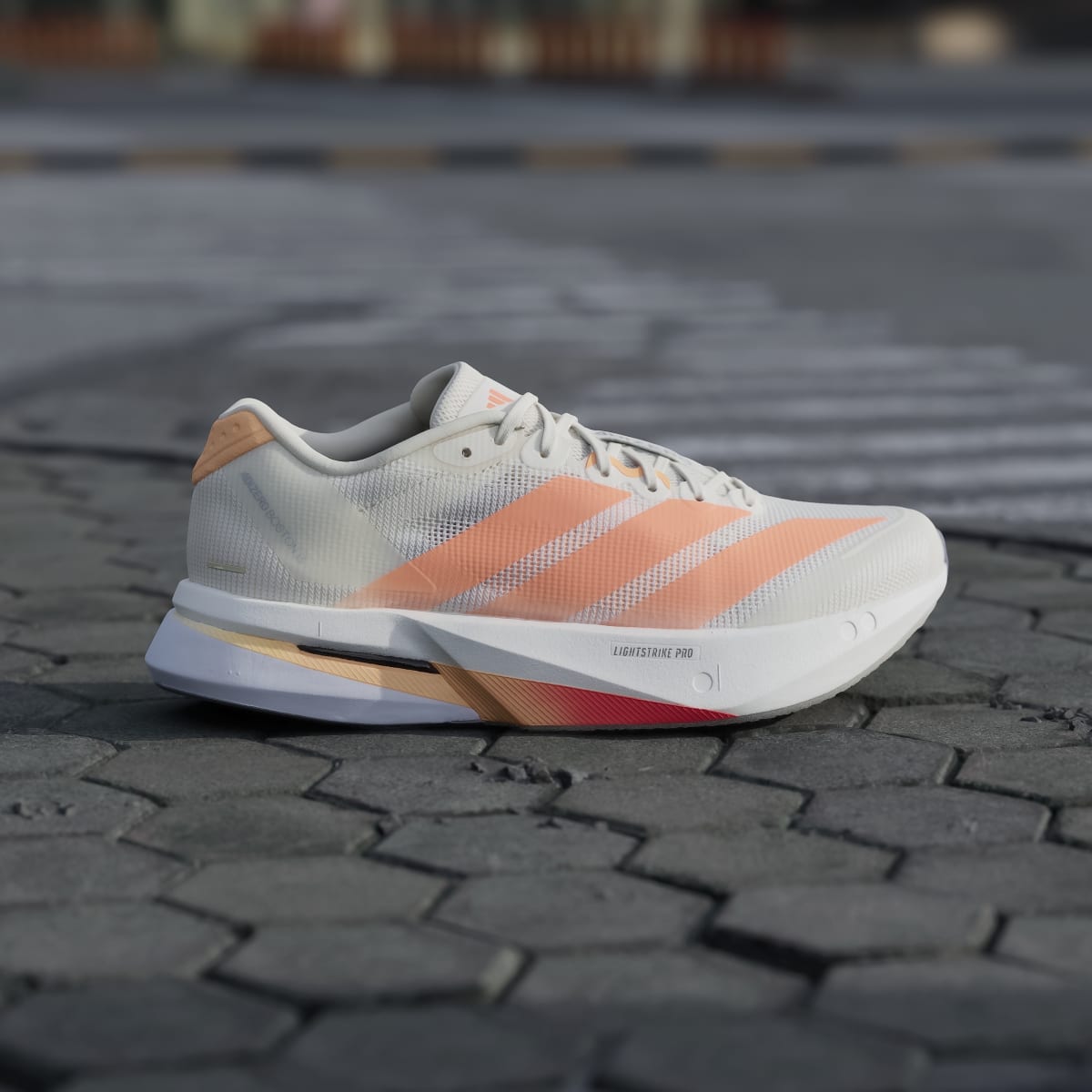 Chaussure Adizero Boston 13 Femme – Off White / Beam Orange / Acid Orange