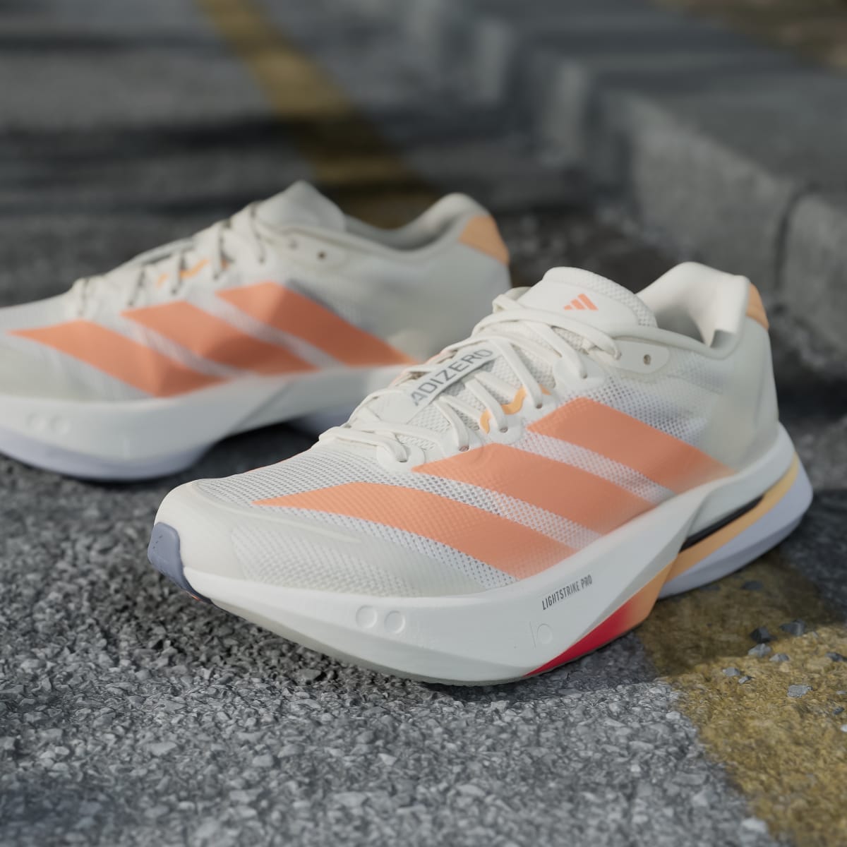 Chaussure Adizero Boston 13 Femme – Off White / Beam Orange / Acid Orange