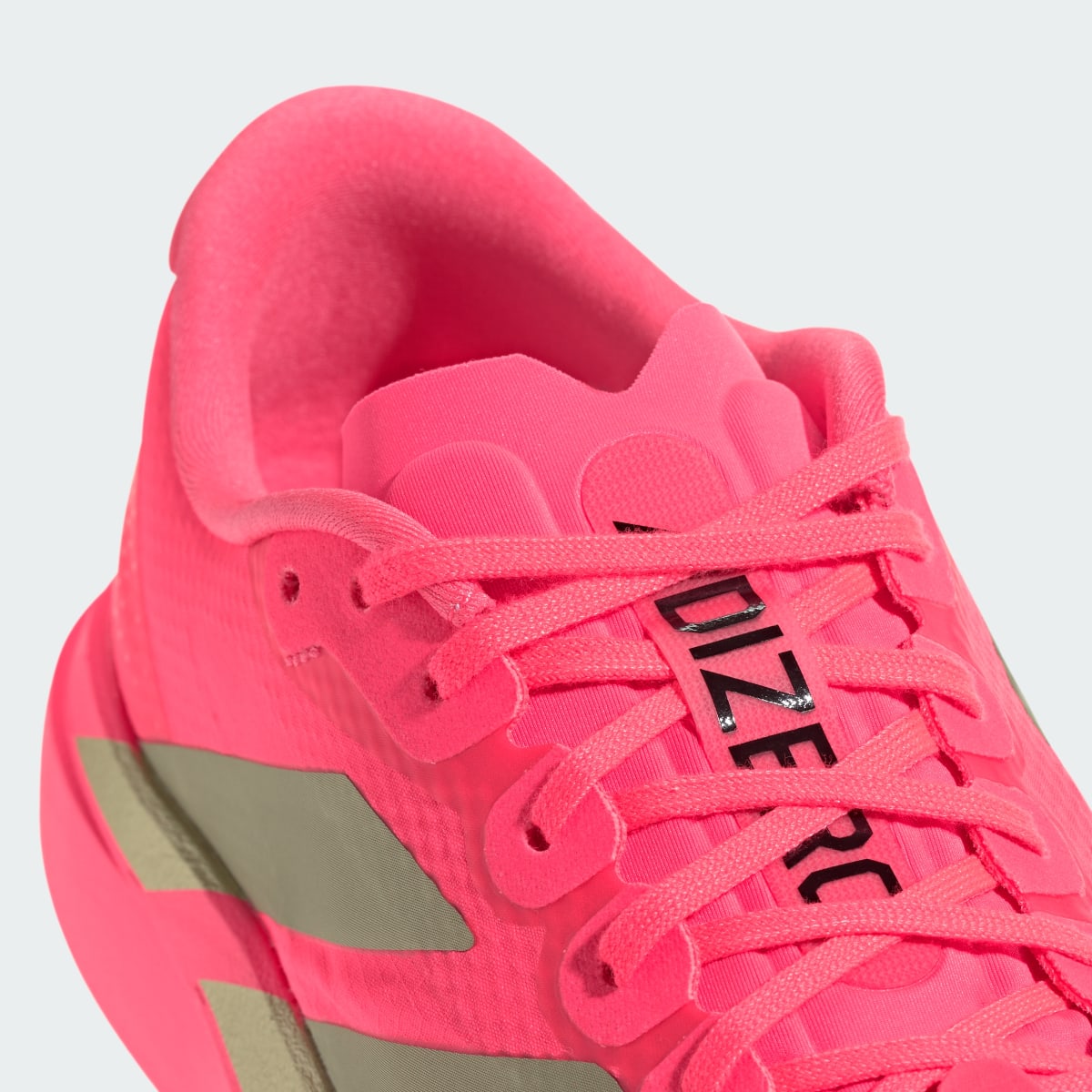 Chaussure Adizero EVO SL Femme – Solar Turbo / Core Black / Carbon