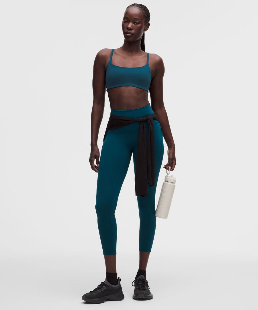 Leggings Wunder Train talle alto con bolsillos 64 cm