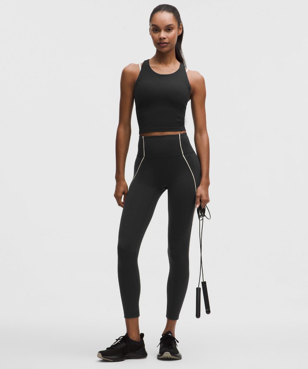 Legging Wunder Train No Line taille haute à finitions passepoilées 64 cm