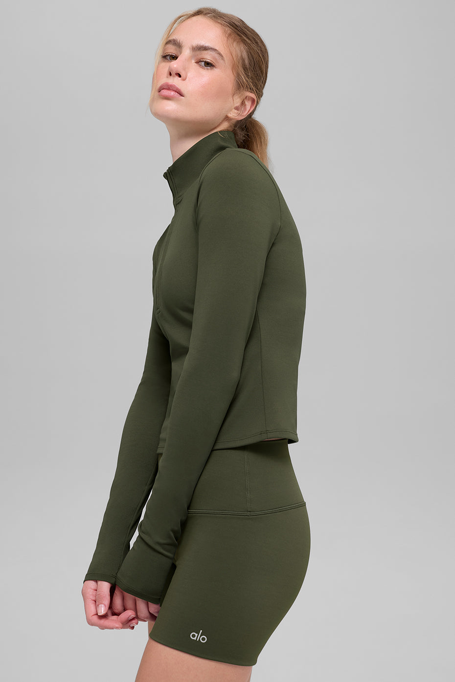 ALO Haut Manches Longues Zippé Softsculpt Precision 1/4 - Green Olive
