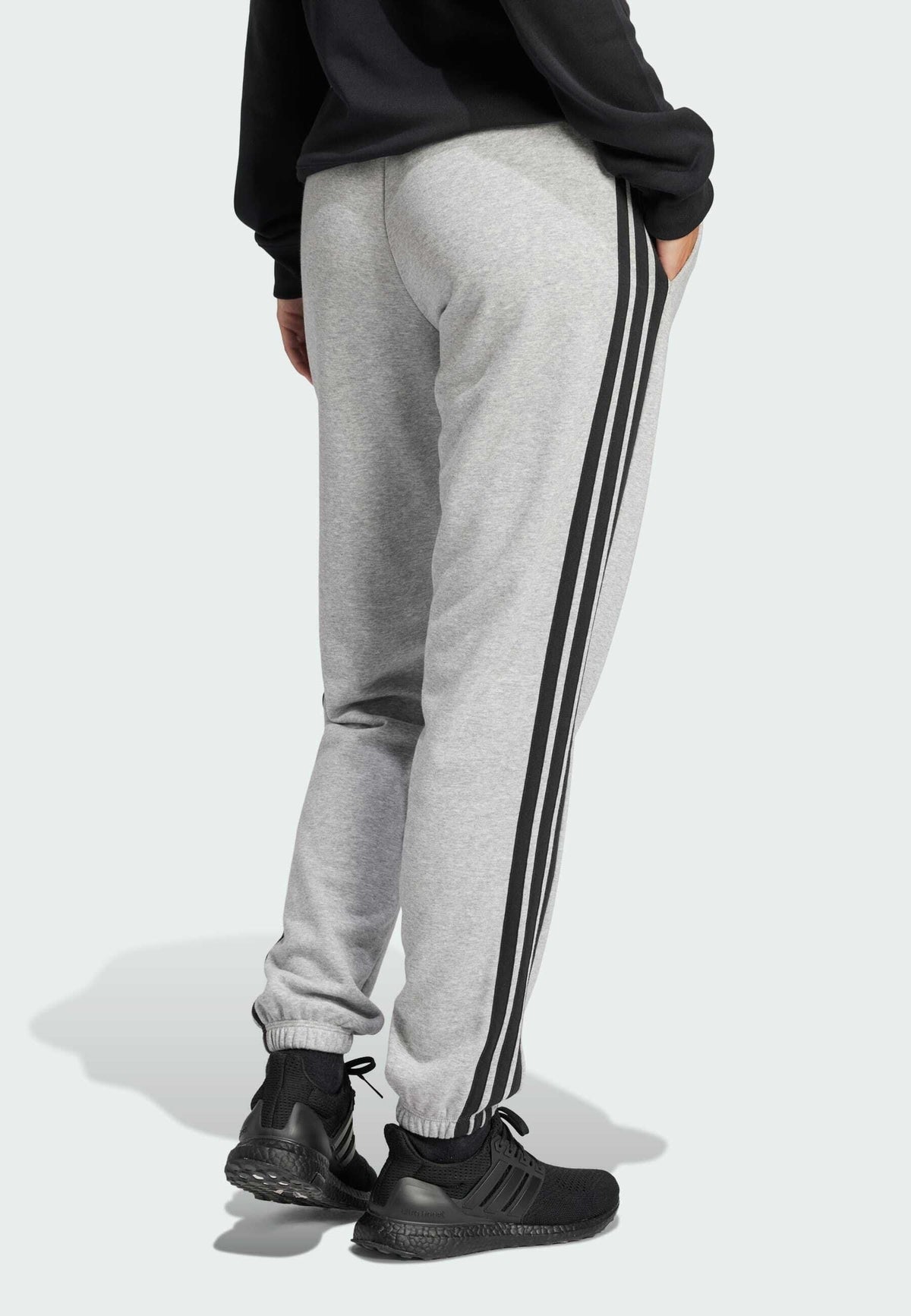 adidas Sportswear Essentials 3 Stripes Cuffed Pants – Pantalon de survêtement Femme – medium grey heather   black/gris chiné